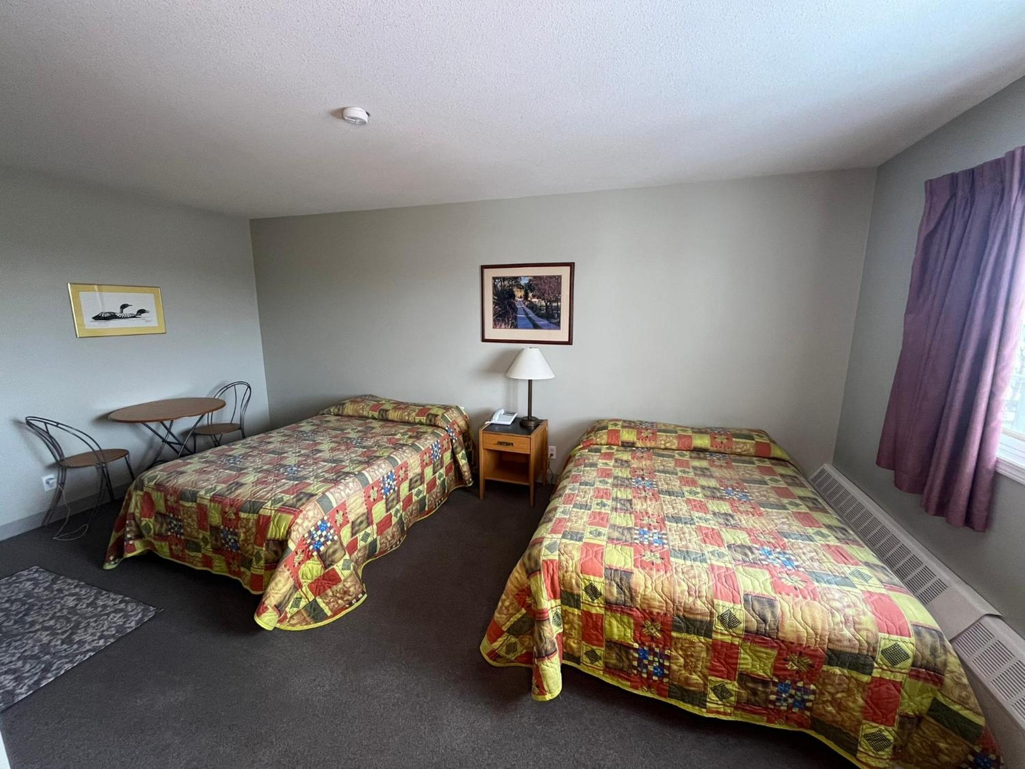 Raccoon Lodge Motel Sylvan Lake Habitación foto